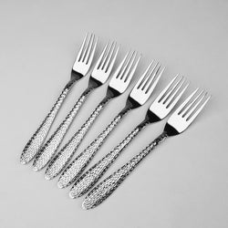 Set of six silver forks with textured handles on a gray background at low price from best cutlery brand iznafatima.com